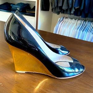 Jimmy Choo size 43, equal to 12.  Immaculate condition.  Gold platform.